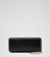 Reiss snake skin clutch bag. Tarragon in black is a rounded bo...