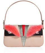 Styled with cheeky fur brows and crystal eyes, Fendi's owl Bag...