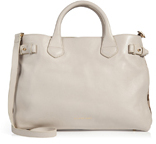 Streamlined in supple ivory calfskin, Burberry London's conver...