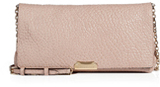 Incredibly cool textured nude leather lends a touch of underst...