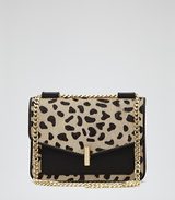 Reiss mini animal-print bag. Constructed from supple black lea...