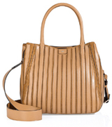 Remixed in tone-on-tone nougat leather paneling, this Anya Hin...