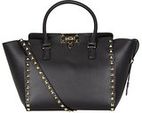 Look no further than Valentino’s Rockstud North/South Shoppe...