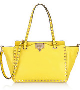 - Pastel-yellow leather (Calf)- Flip lock fastening at open to...
