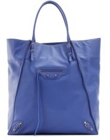 Royal blue seamed leather tote with aged brass stud detailing....